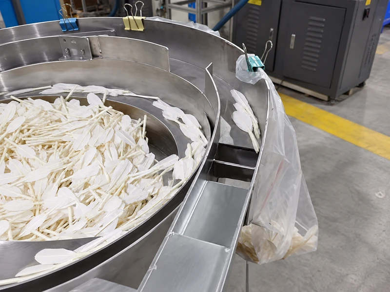 High-frequency electromagnetic vibration feather orientation feeder
